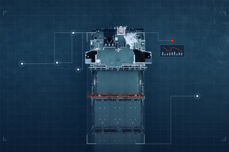 Top-down view of a container ship at sea