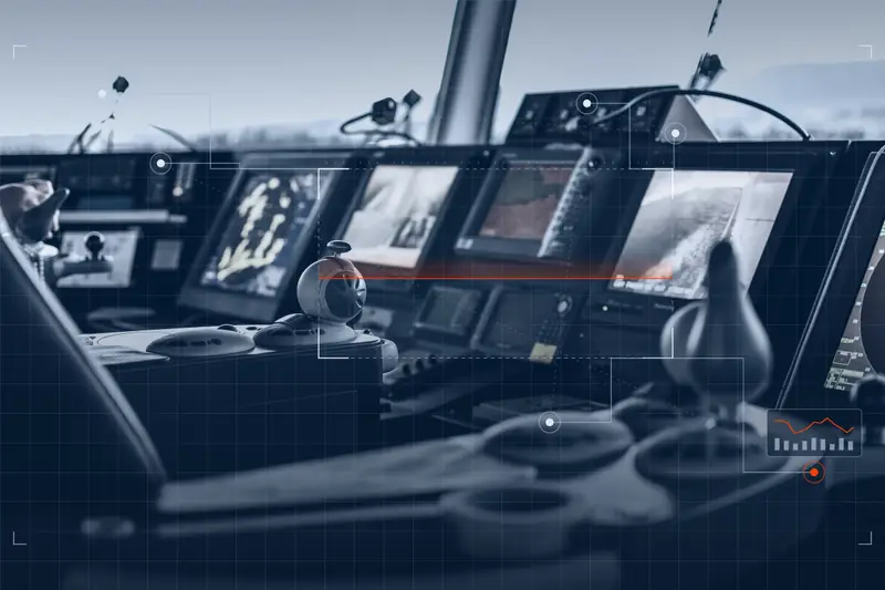 Navigation consoles and screens on a ship's bridge